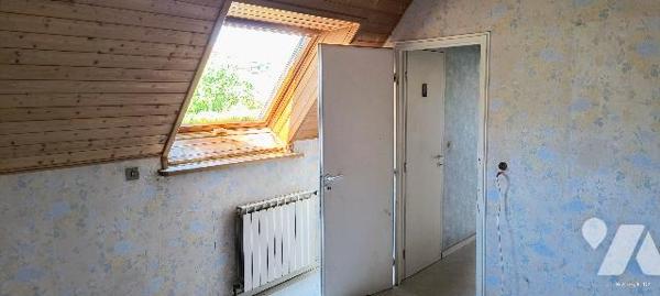 A rénover : Maison de 137 m2 datant de 1900 sur un terrain 7,54 ares traversant.