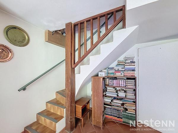 A Vendre Maison des années 1960 de 133 m² sur sous-sol avec jardin et garage de 64 m²