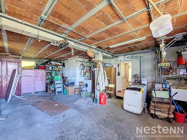 A Vendre Maison des années 1960 de 133 m² sur sous-sol avec jardin et garage de 64 m²