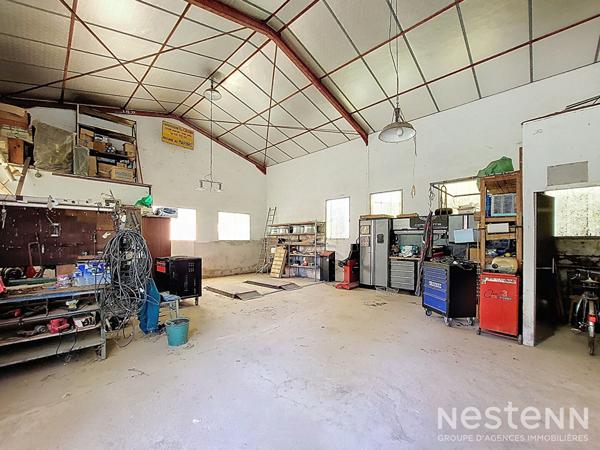 A Vendre Maison des années 1960 de 133 m² sur sous-sol avec jardin et garage de 64 m²