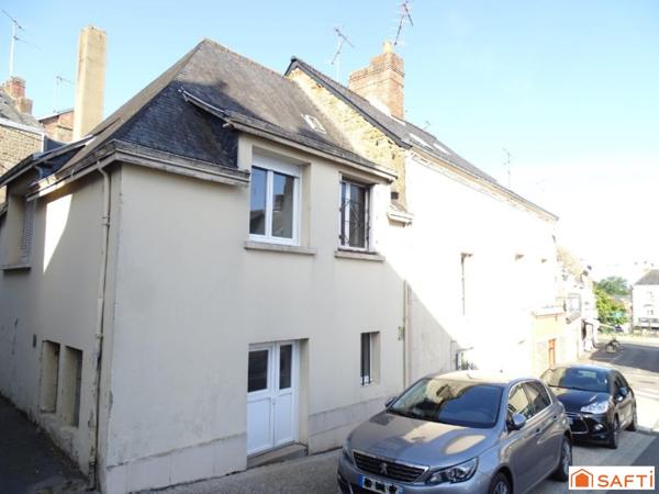 Immeuble avec partie commerciale et un appartement