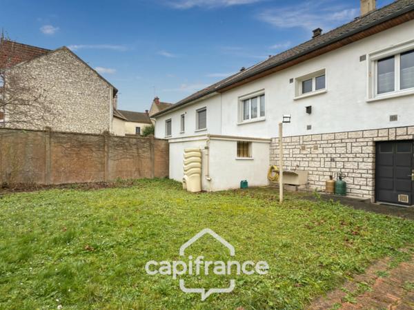 Maison 6 pièces avec jardin proche centre-ville