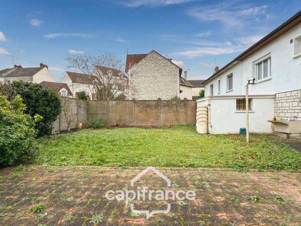 Maison 6 pièces avec jardin proche centre-ville