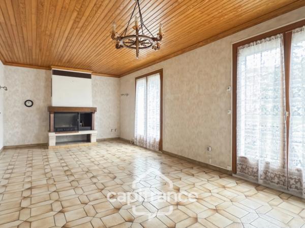 Maison 6 pièces avec jardin proche centre-ville