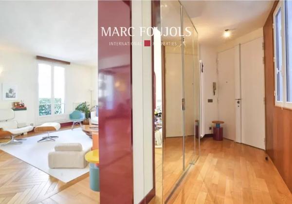 Paris XVI – Trocadéro appartement de 130 m² au dernier étage avec balcons