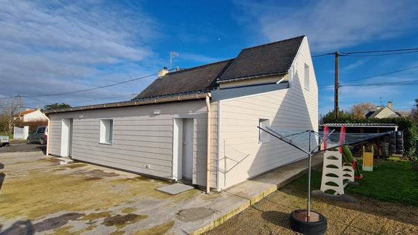 Grande maison familiale d'environ 135m² avec vie de plain-pied, jardin et piscine en campagne de Trignac