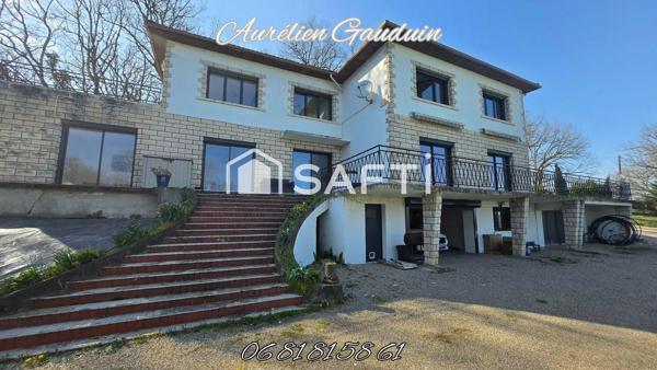 Maison rénovée avec volumes, dépendances et cadre nature