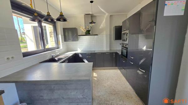 Maison rénovée avec volumes, dépendances et cadre nature