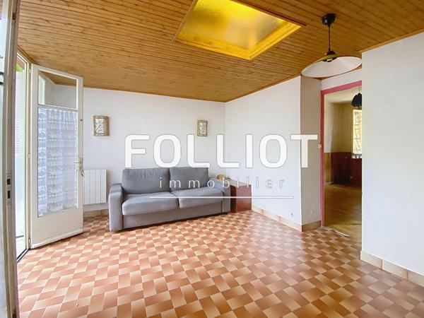 A vendre 2 pièces en rez-de-jardin avec parking