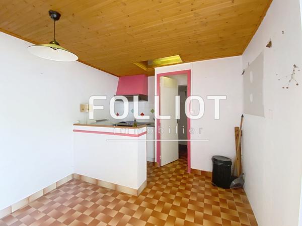 A vendre 2 pièces en rez-de-jardin avec parking