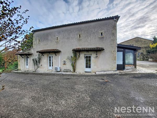 A Vendre Maison en pierre rénovée de 98 m² avec véranda et jardin non attenant à Roquepine