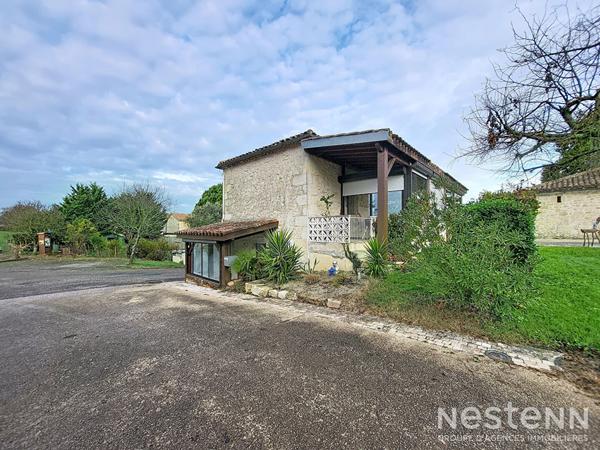 A Vendre Maison en pierre rénovée de 98 m² avec véranda et jardin non attenant à Roquepine