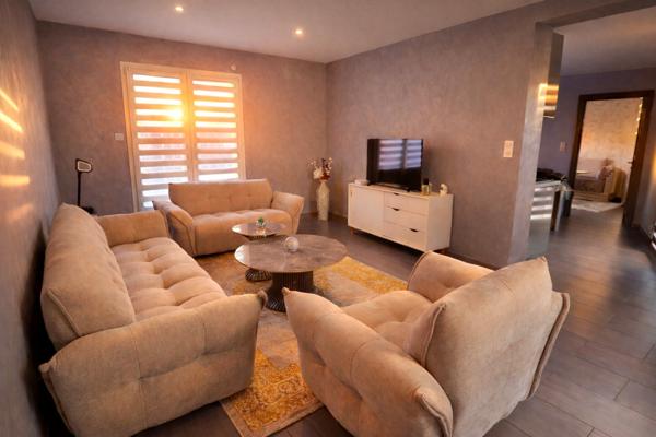 Superbe T6 en rez-de-jardin avec garage et terrasse