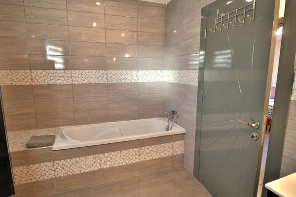 Superbe T6 en rez-de-jardin avec garage et terrasse