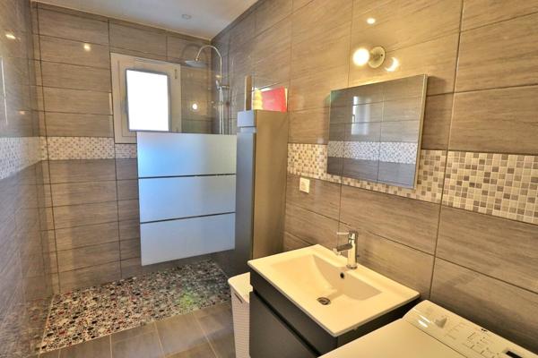 Superbe T6 en rez-de-jardin avec garage et terrasse