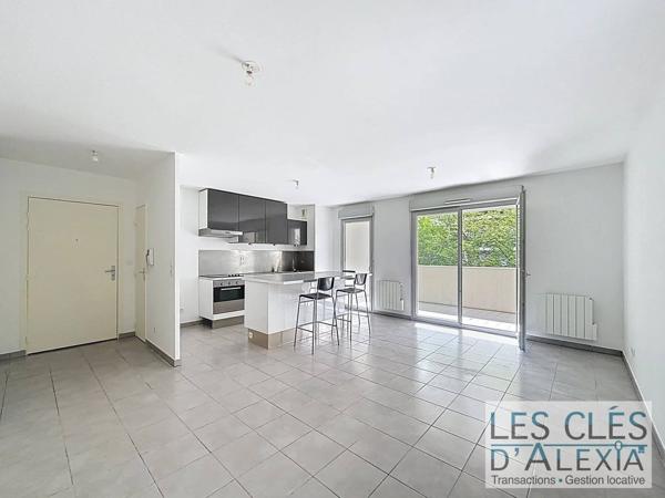 Appartement T3 - 64 m² avec balcon et garage
