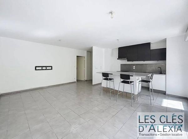 Appartement T3 - 64 m² avec balcon et garage
