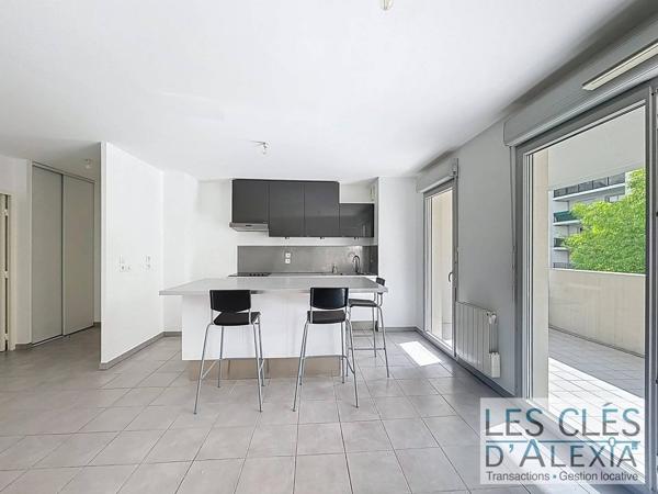 Appartement T3 - 64 m² avec balcon et garage