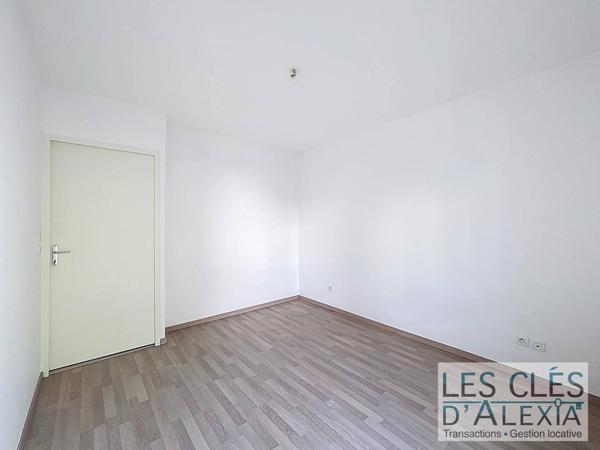 Appartement T3 - 64 m² avec balcon et garage
