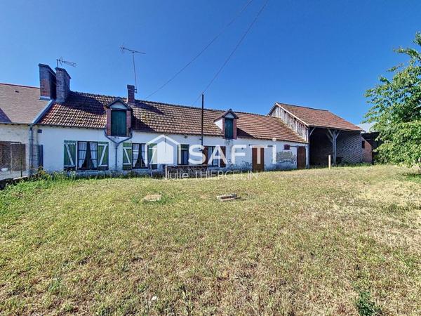 Maison à rénover avec grand terrain et dépendances