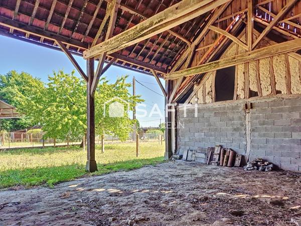 Maison à rénover avec grand terrain et dépendances