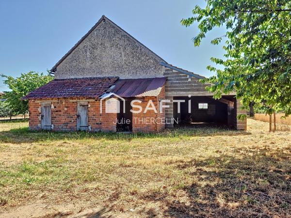 Maison à rénover avec grand terrain et dépendances