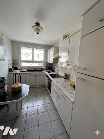 Appartement 3 pièces avec balcon, cave et stationnement –  Au Calme 