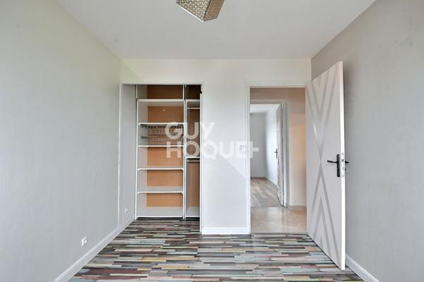 Appartement T4 de 73 m² avec balcon, parking et cave à Villeurbanne (69100).