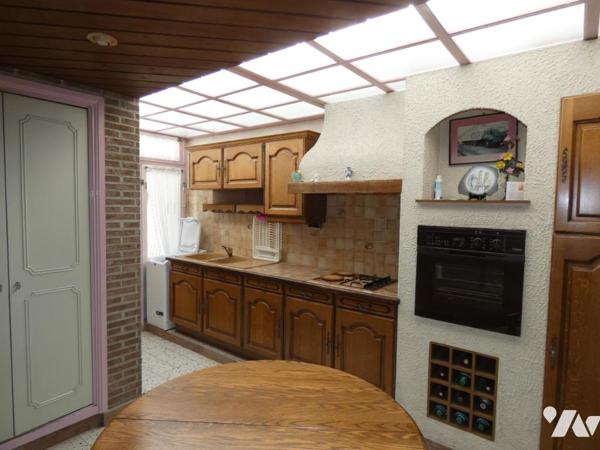 Comines maison trois chambres avec cour