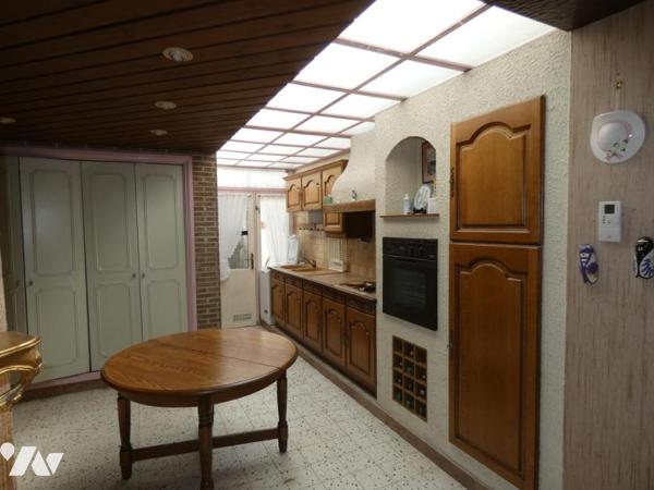 Comines maison trois chambres avec cour