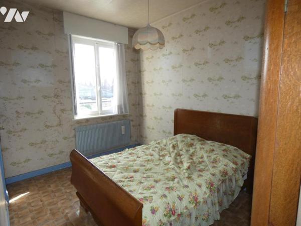 Comines maison trois chambres avec cour