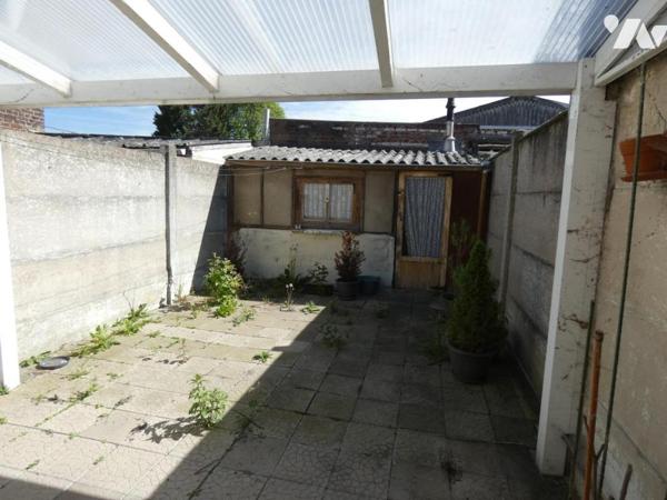 Comines maison trois chambres avec cour
