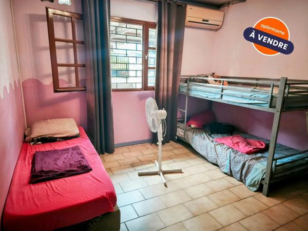 Lot de 2 maisons mitoyennes avec piscine et jardin – Quartier Lac Bleu, Saint-Laurent-du-Maroni