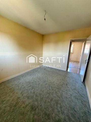 Maison familiale 98 m² avec garage et jardin