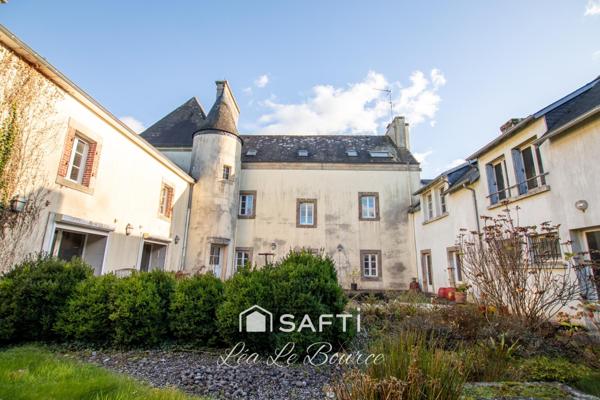 Manoir d’exception de1863 au cœur d’un parc de 2,9 hectares.