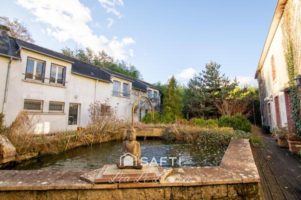 Manoir d’exception de1863 au cœur d’un parc de 2,9 hectares.