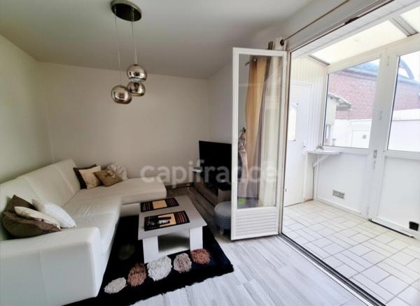 *Sainte-Cecile*Plain-pied de 51 m² à 200 m de la place, terrasse de 40 m², sud-ouest, sans vis-à-vis