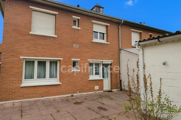 « Maison des années "60" à rénover en milieu urbain »