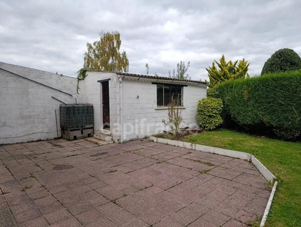 « Maison des années "60" à rénover en milieu urbain »