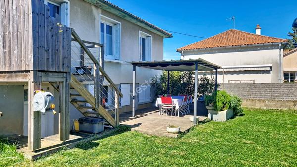 Maison familiale lumineuse avec 5 chambres, balcon, terrasse et jardin à Poitiers