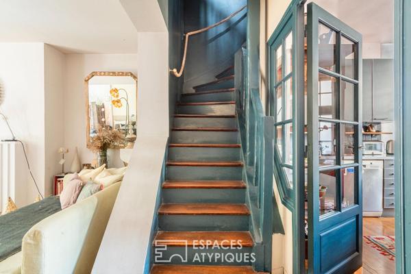Maison avec cour pavée et jardin à l’esprit japonisant