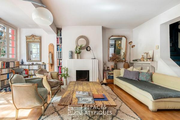 Maison avec cour pavée et jardin à l’esprit japonisant
