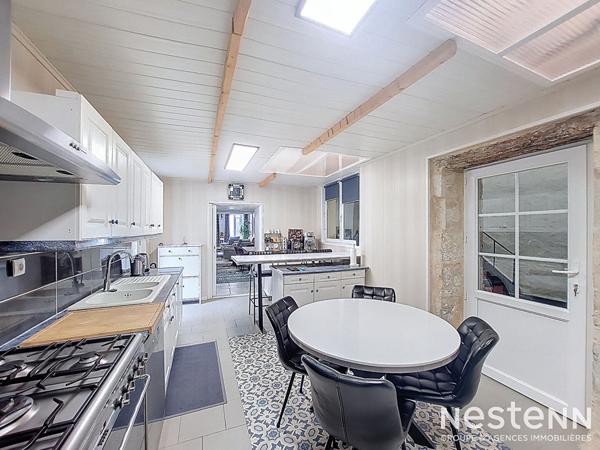 A Vendre 2 Maisons en pierre de caractère avec jardin et piscine au centre de Lectoure.