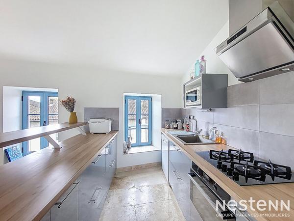 A Vendre 2 Maisons en pierre de caractère avec jardin et piscine au centre de Lectoure.