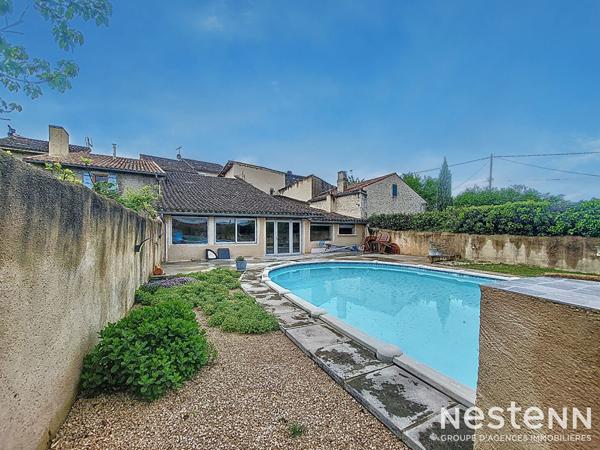 A Vendre 2 Maisons en pierre de caractère avec jardin et piscine au centre de Lectoure.