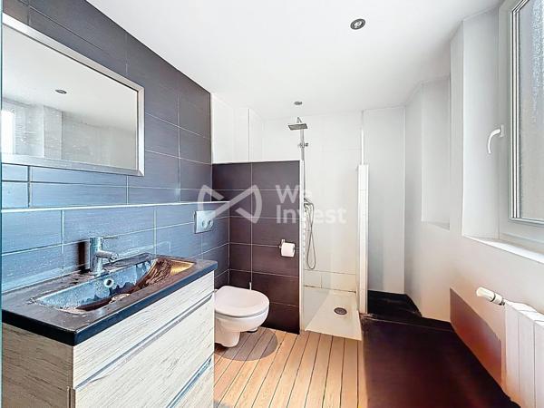 À Hettange-Grande appartement meublé déjà loué avec parking et cave privatifs : un investissement rentable dès l’acquisition.