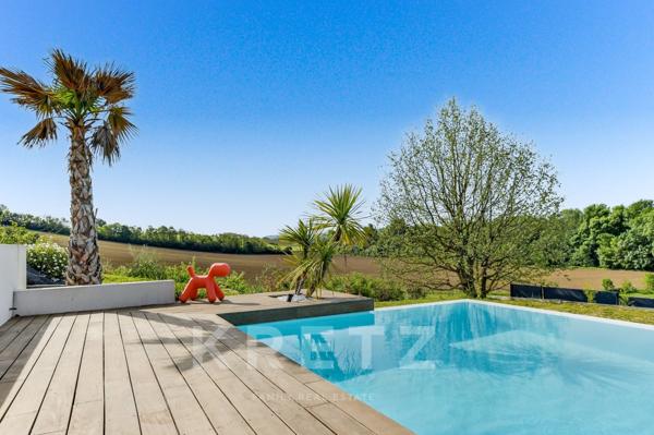 Villa contemporaine avec piscine à débordement et vue, aux portes de Balma / Toulouse
