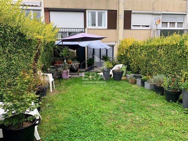 Maison 4 pièces avec grand jardin et garage