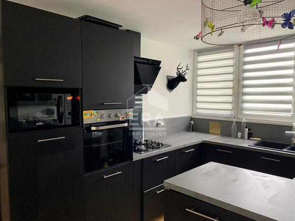 Maison 4 pièces avec grand jardin et garage