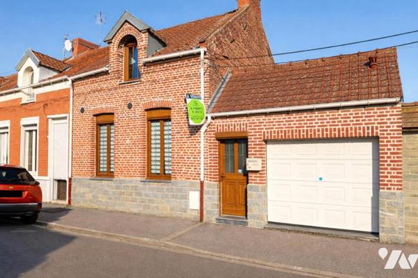 Maison semi individuelle avec garage 